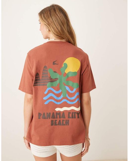 ASOS Orange Oversized Tee With Abstract Holiday Graphic