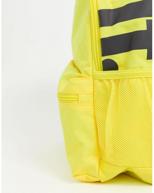 Nike Just Do It Mini Backpack in Yellow | Lyst Nike Just Do It Mini Backpack in Yellow | Lyst