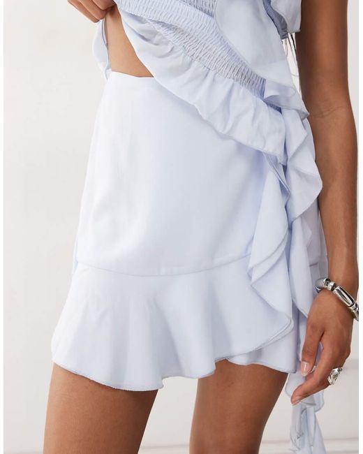 Amy Lynn Natural Asymmetric Wrap Ruffle Mini Skirt Co-Ord