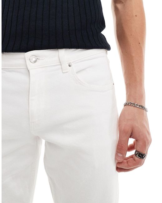 Jeans slim elasticizzati bianchi di ASOS in Blue da Uomo