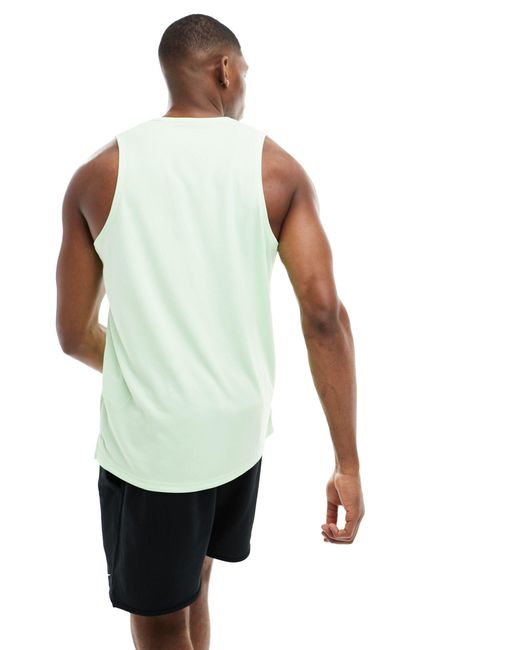 Camiseta verde sin mangas dri-fit miler Nike de hombre de color White