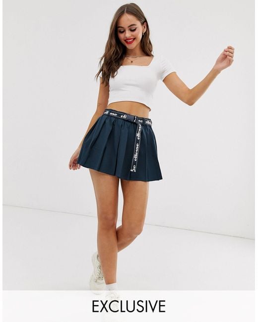 Womens Clothing Skirts Mini skirts PUMA Synthetic Embroidered-logo Cropped T-shirt in Blue 