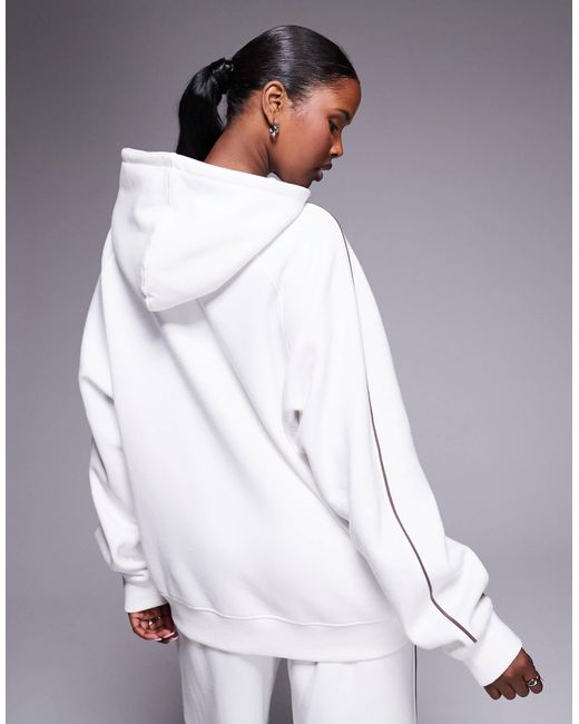 Sweat à capuche d'ensemble oversize en coton majoritaire à broderie logo et bande latérale - blanc Kaiia en coloris Gray