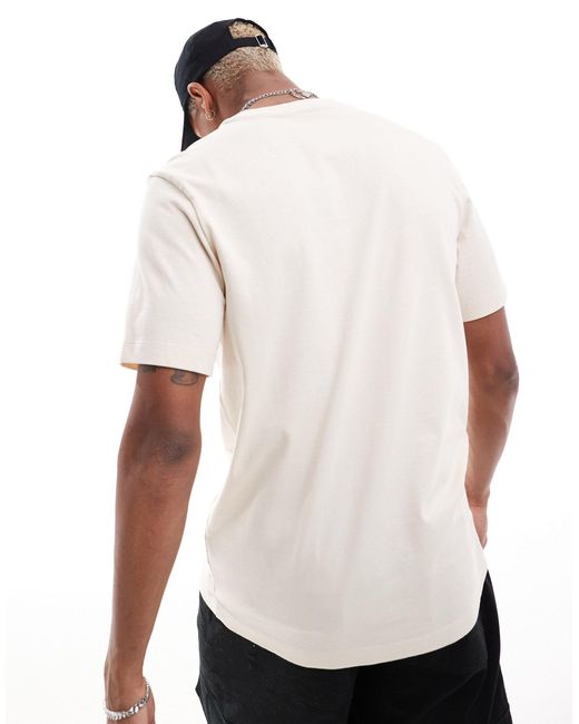 Camiseta color con logo pequeño jumpman Nike de hombre de color White