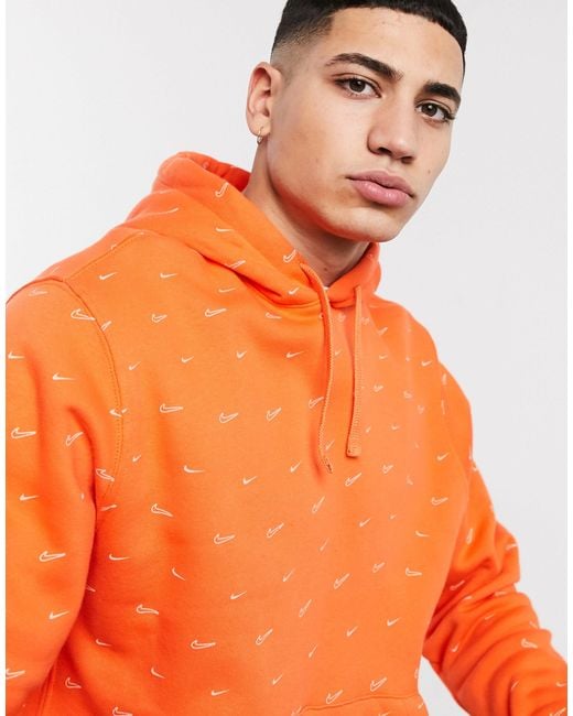 Nike Orange All-over Swoosh Print Hoodie for men