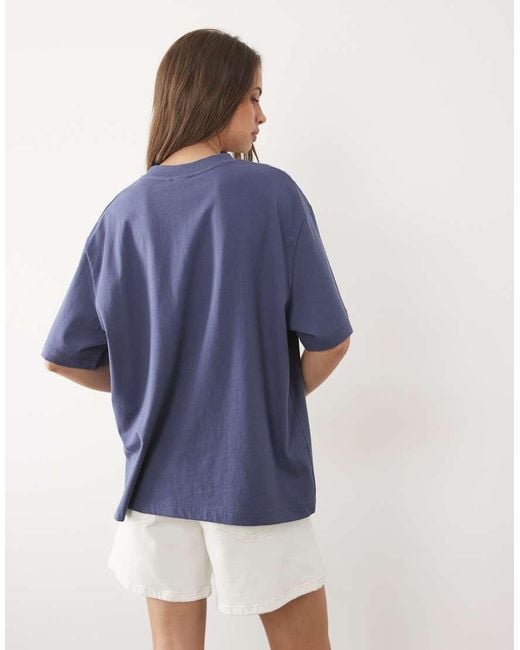 ASOS Blue Oversized T-Shirt With Tofino Surfers Graphic