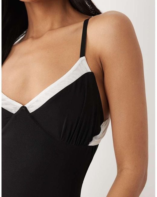 ASOS Black Monochrome High Low Hem Mesh Midi Length Dress With Peek A Boo Hem