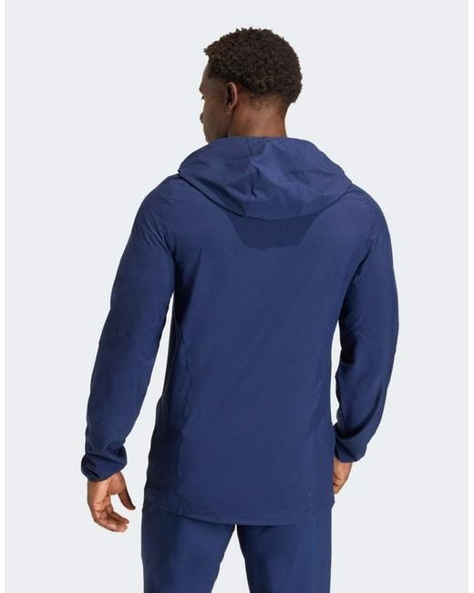 Adidas Originals Blue Tiro Travel Windbreaker Jacket for men