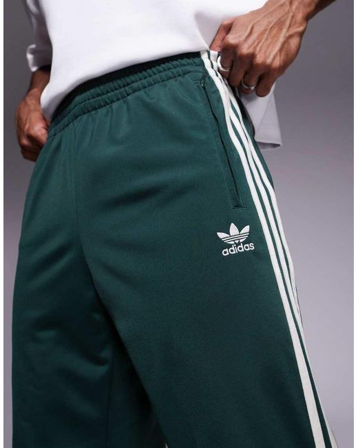 Adidas Originals Green Firebird Track Pants for men