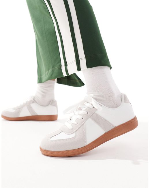 Sneakers bianche con suola di Truffle Collection in White
