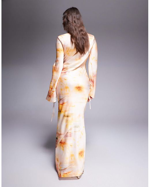 Robe longue satinée à imprimé fleurs abstrait DASKA en coloris Multicolor