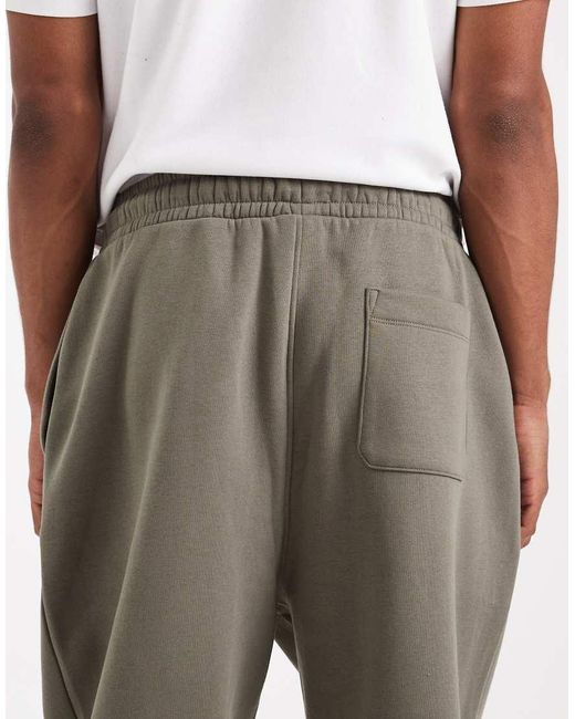 Joggers Caquis Holgados Básicos Essentials De -Verde ASOS de hombre de color Green