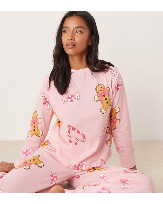 ASOS Pink Asos Design Petite Gingerbread & Candy Cane Long Sleeve Top & Trouser Pyjama Set