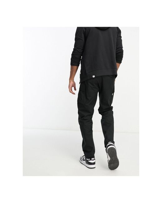 The North Face Black Heritage Anticline Cargo Trousers for men