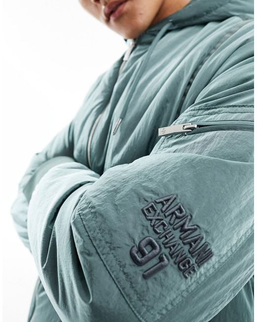 Armani Exchange Blue Utility Crinkle Nylon Hooded Bomber Jacket for men