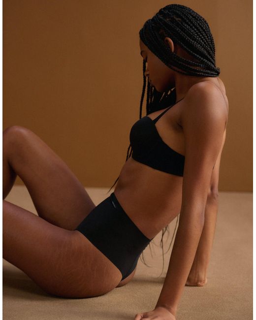 Shapewear - string sculptant en tulle Calvin Klein en coloris Brown