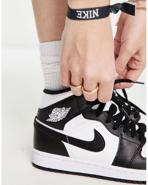 Air - 1 - baskets mi-hautes - et noir Nike en coloris White