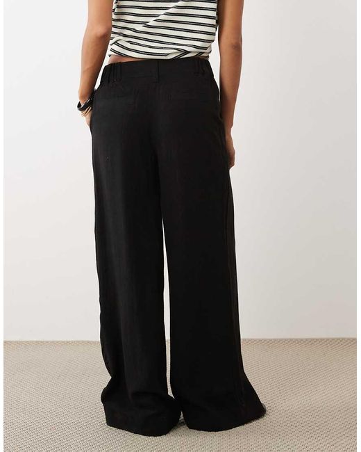 ASOS Black Asos Design Petite Wide Leg Trousers With Pleat Detail