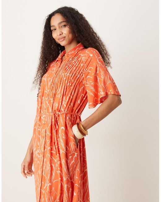 Vestito Arancione A Fiori Con Maniche Svasate Con Bottoni E Cintura Sul Davanti di Y.A.S in Orange