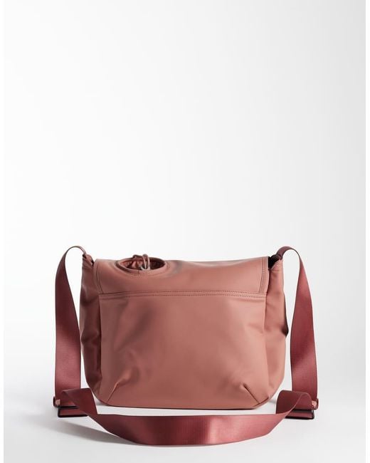 Rains Pink 16640 Waterproof Bottle Cross Body Bag
