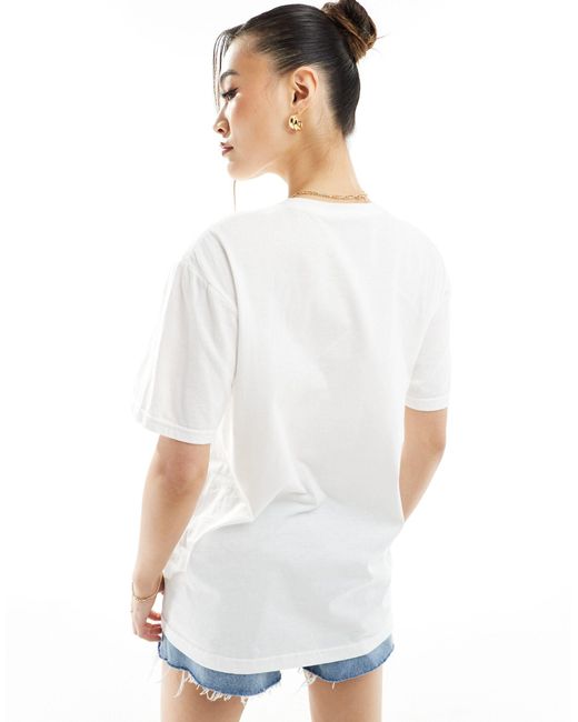 T-shirt bianca con stampa grafica arcobaleno di In The Style in White