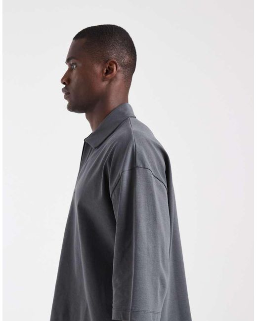 ASOS Black Heavyweight Boxy Oversized Polo With Half Sleeve for men