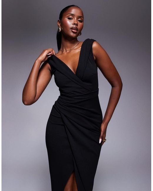 black off the shoulder casual dress Iconic / XS Finish your look with a coloured shoulder bag to add a pop of colour on your next date night Off The Shoulder Black Dresses