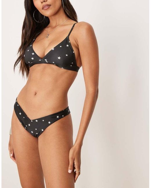 Slip Bikini Neri A V Con Stelle Scintillanti di OOSC in Black