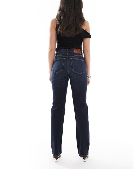 Jeans Dritti A Vita Alta Color Indaco di Calvin Klein in Blue