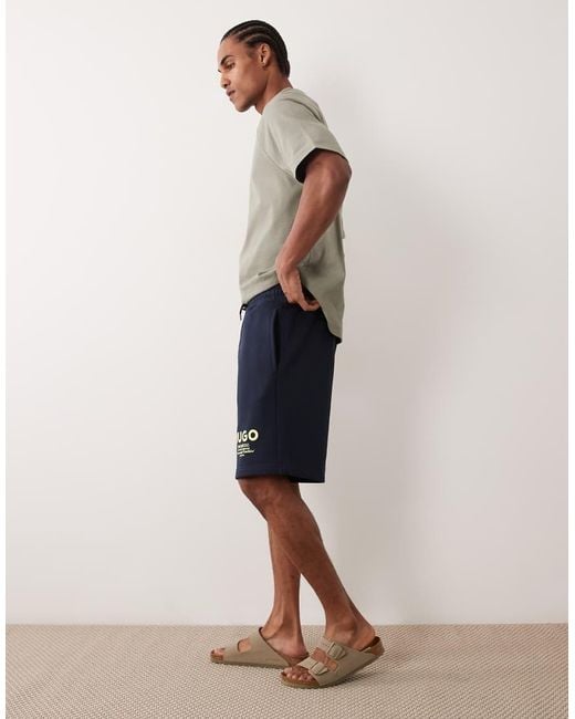 HUGO Natural Loose Fit Shorts With Logo Print for men