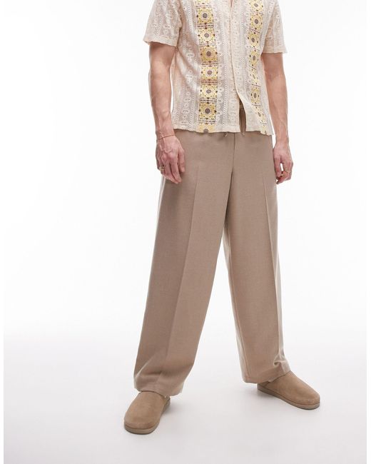 Pantaloni a fondo ampio color pietra testurizzato di Topman in Natural da Uomo