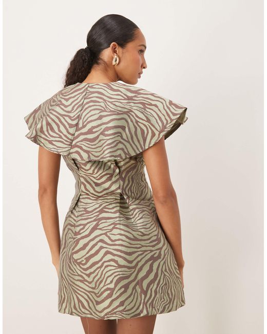 Robe courte boutonnée en jacquard - kaki à zébrures Ghospell en coloris Natural