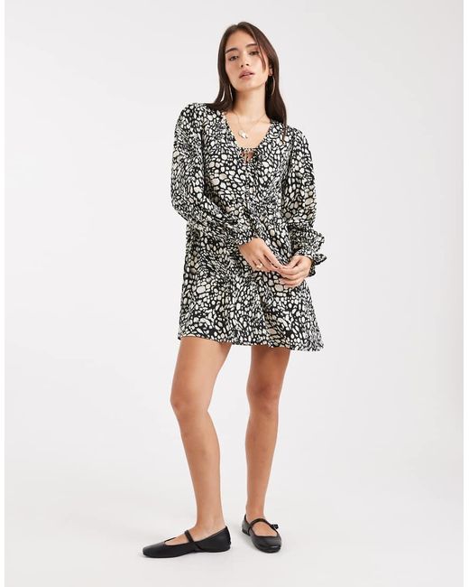Wednesday's Girl White V Neck Floaty Abstract Print Mini Dress