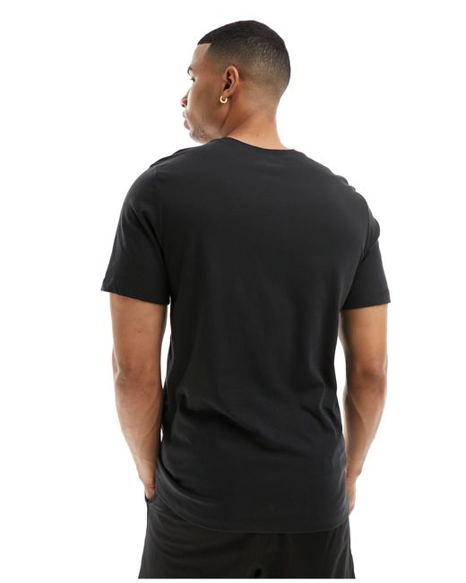 Dri-fit iykyk - t-shirt nera con logo di Nike in Black da Uomo
