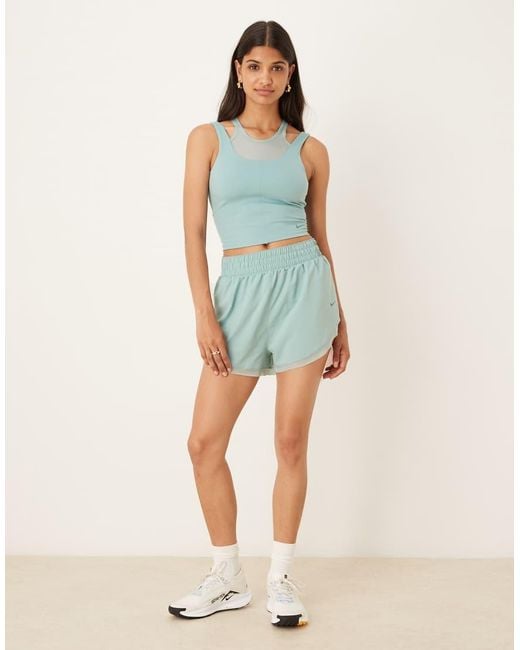 Top De Tirantes Con Diseño Superpuesto Dri-Fit De Nike One Training Nike de color Blue