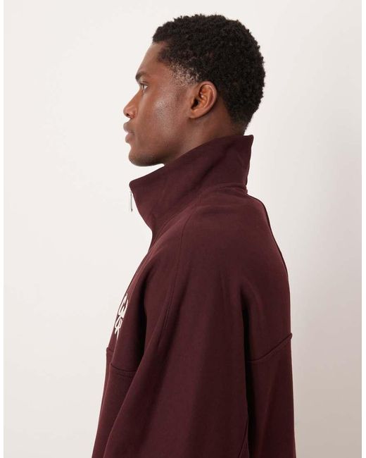 Calvin Klein Red High Neck Script Logo 1/4 Zip Sweatshirt for men