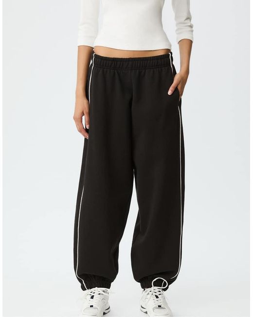 Stradivarius Joggingbroek Met Bies in het Black