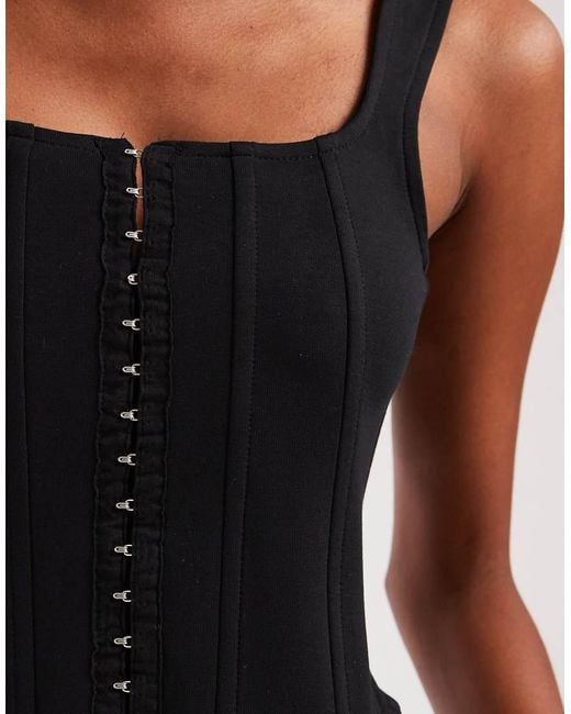 Top Corsetero Con Corchetes Delanteros De ASOS de color White