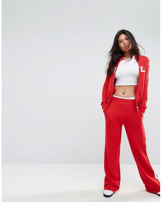 Fila Red Tracksuit Bottoms With Side Stripe