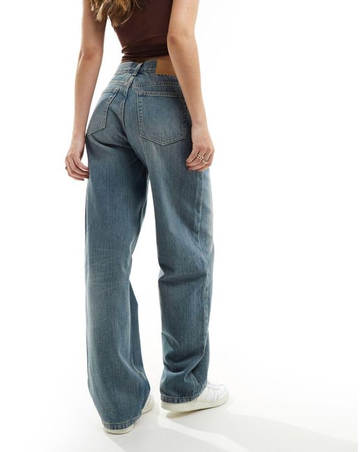 Rail - jeans dritti a vita medio alta a fondo ampio color trove di Weekday in Blue