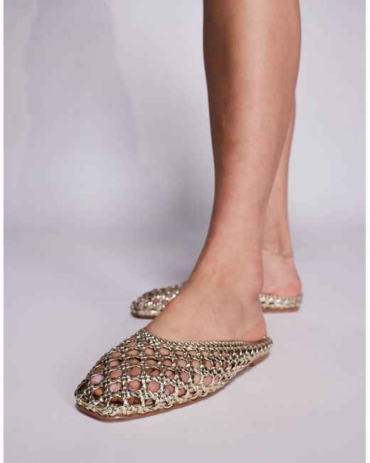 SIMMI Simmi london – cassius – flache pantoletten aus gold-metallic-kunstleder