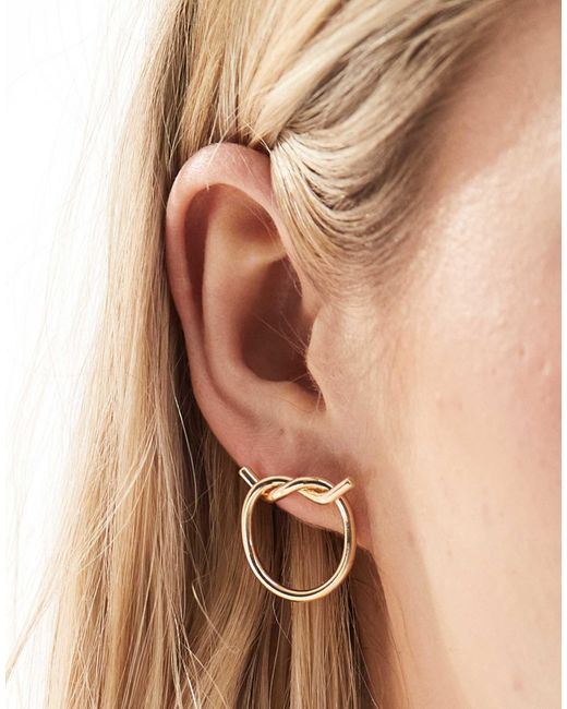 Clous d'oreilles motif nœud ASOS en coloris Natural