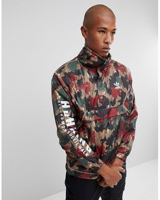 frecuencia proyector Piquete Cortavientos con estampado de camuflaje CY7871 Hu Hiking de x Pharrell  Williams adidas Originals de hombre de color Rojo | Lyst
