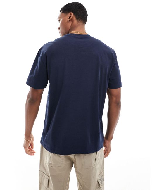 Camiseta holgada con estampado celestial en el pecho ASOS de hombre de color Blue