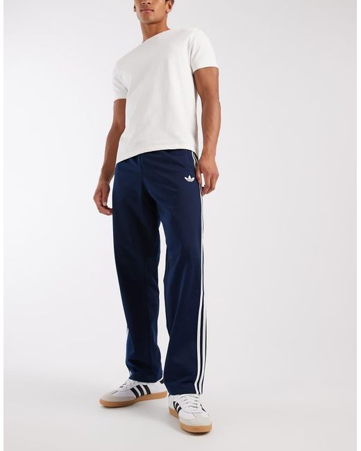 Adidas Originals Blue Firebird Track Pants for men