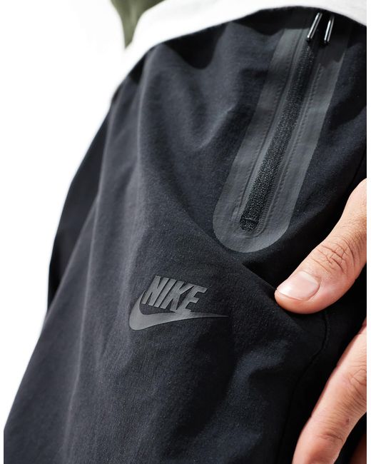 Nike Black Tech Woven Oversized Pants for men
