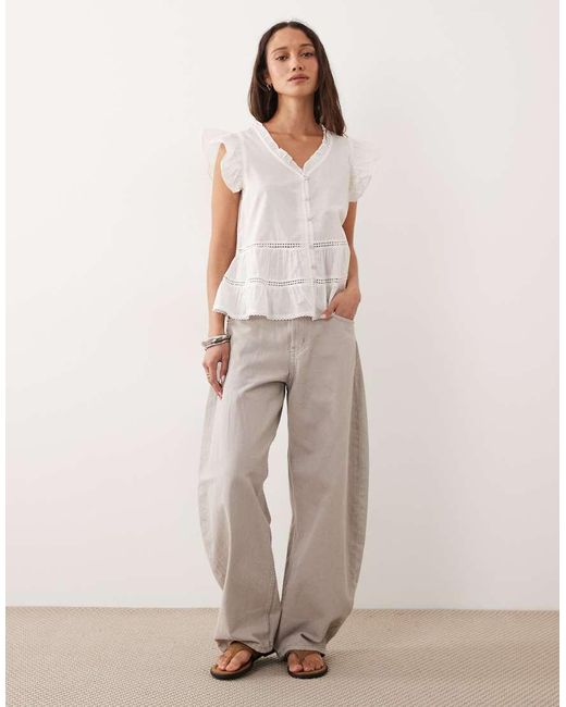 Jdy White Sleeveless V Neck Shirt With Frill Detail
