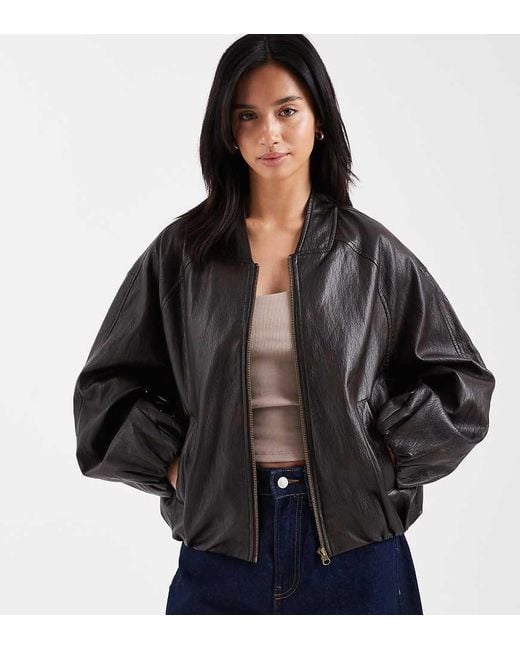 ASOS Black Asos Design Petite Washed Leather Look Oversized Bomber Jacket