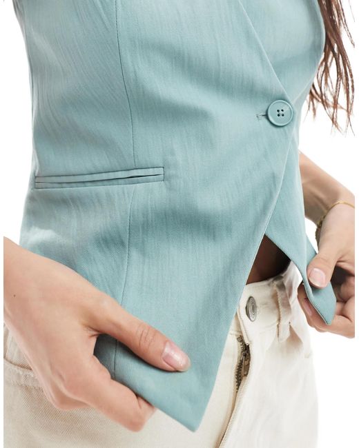 Stradivarius Blue – asymmetrische weste
