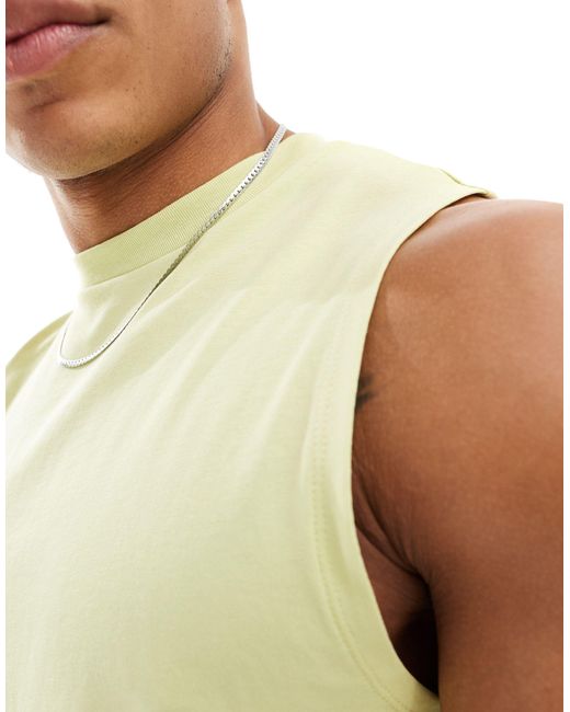 Camiseta verde sin mangas con cuello redondo ASOS de hombre de color White